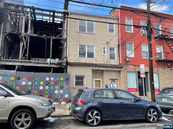 a car parked in front of a building