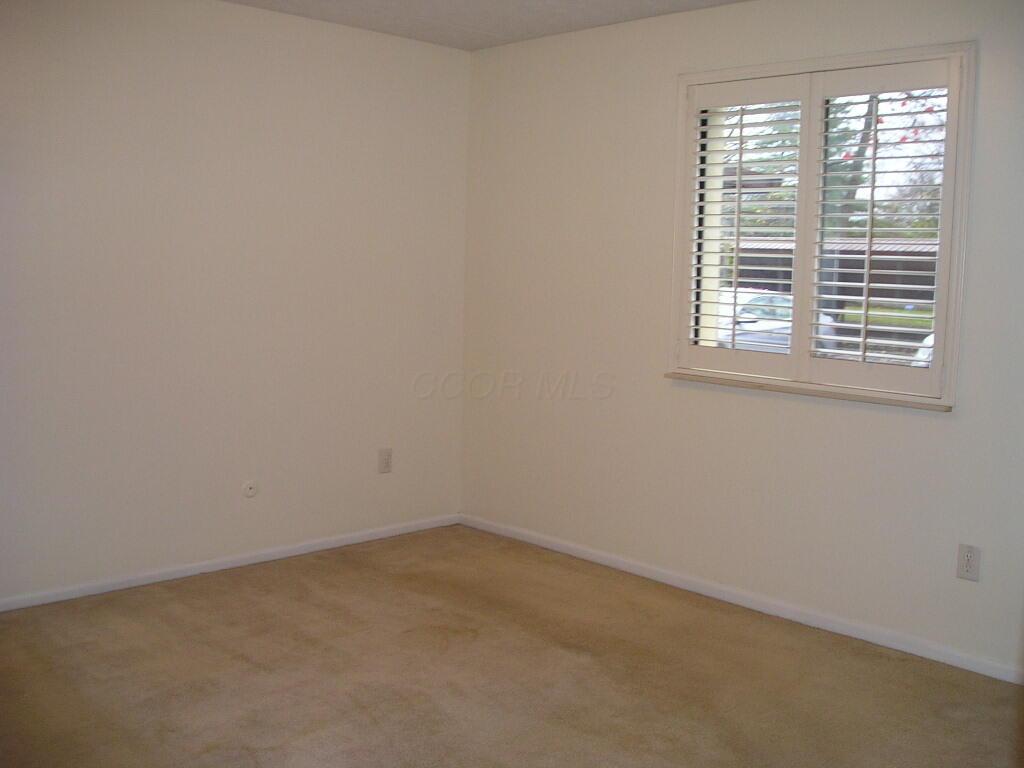 3939 Karl Road, Unit 111 Columbus, OH 43224 - Photo 4 of 22 Master Suite Freshly painted and carpets cleaned