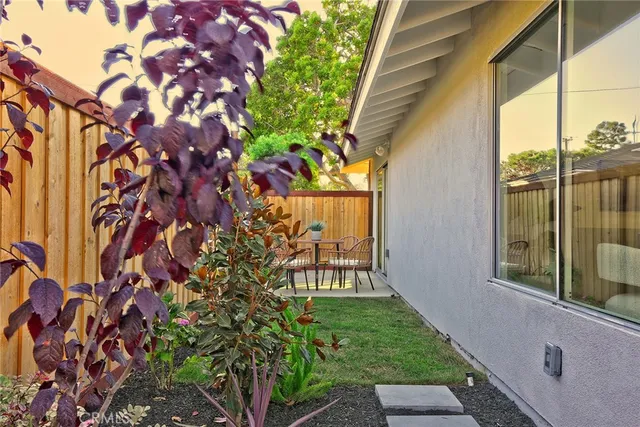 a view of a yard from a balcony