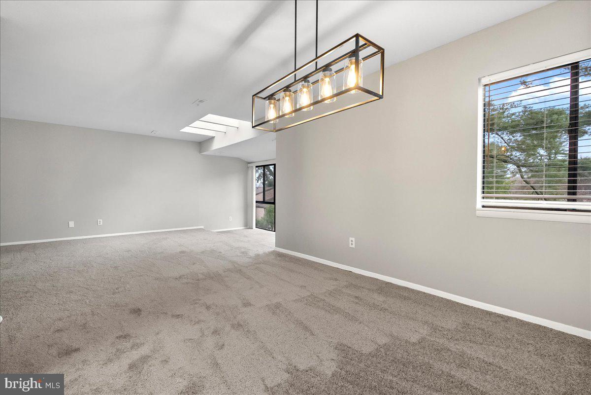 19030 Mills Choice Road, Unit 6 Gaithersburg, MD 20886 - Photo 6 of 21 a view of an empty room with a window