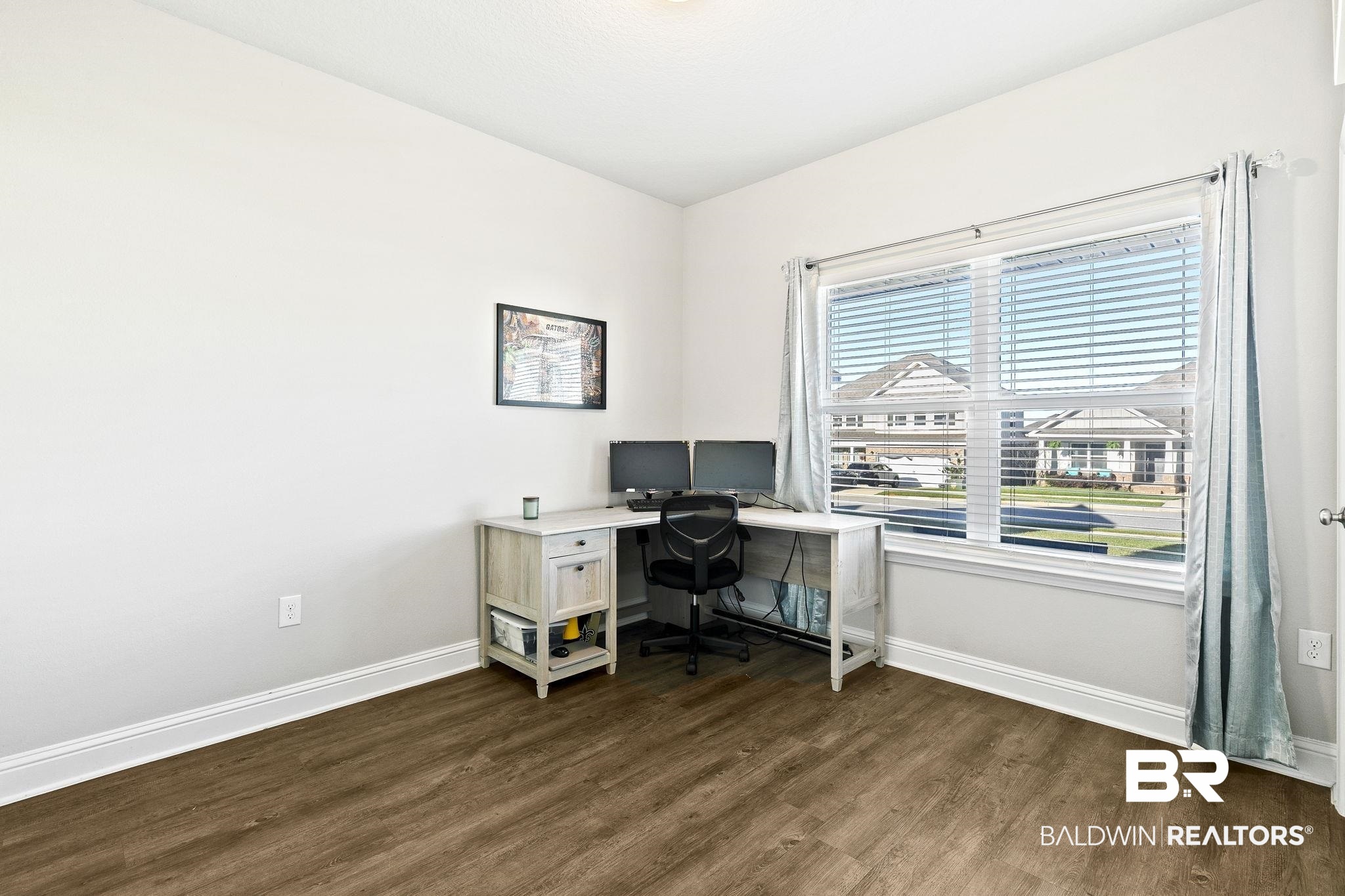 31610 Memphis Loop Daphne, AL 36527 - Photo 27 of 67 Office area with baseboards and dark wood finished floors
