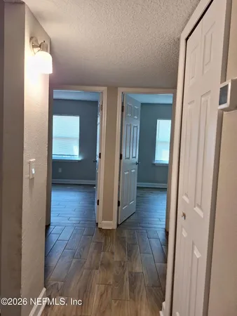a view of a room with racks on the wall