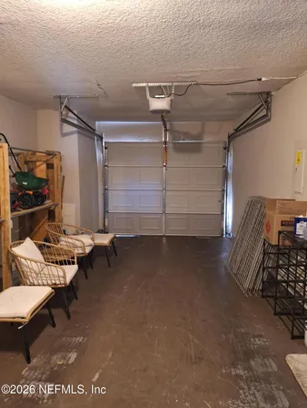 a view of hallway with wooden floor