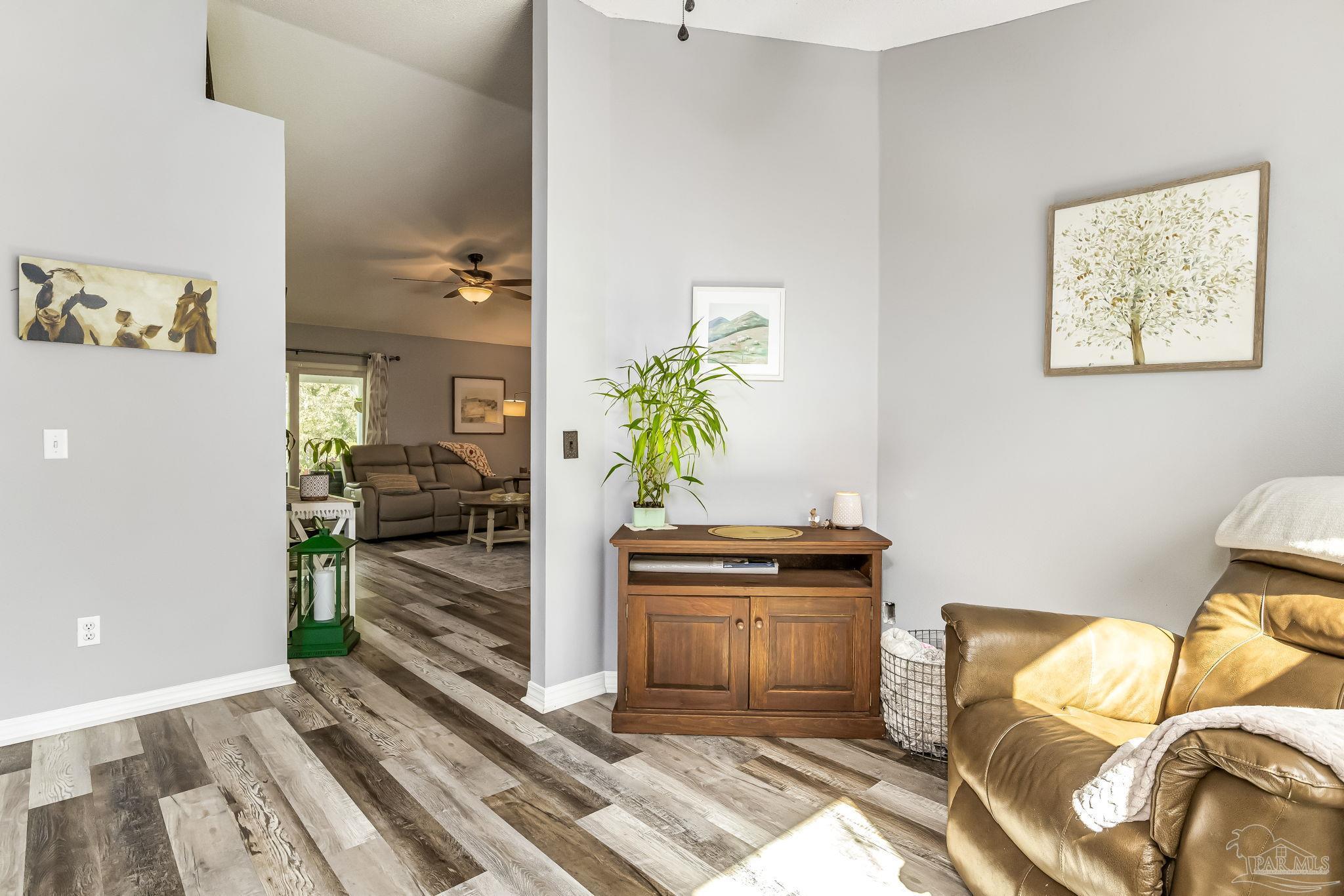 2000 Winners Circle Cantonment, FL 32533 - Photo 14 of 59 a living room with furniture and a rug