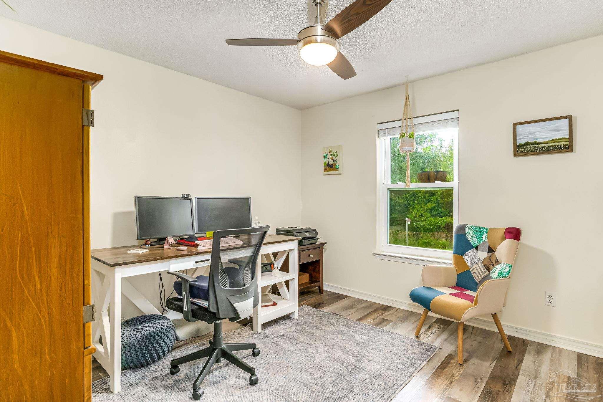 2000 Winners Circle Cantonment, FL 32533 - Photo 32 of 59 a workspace with furniture and window