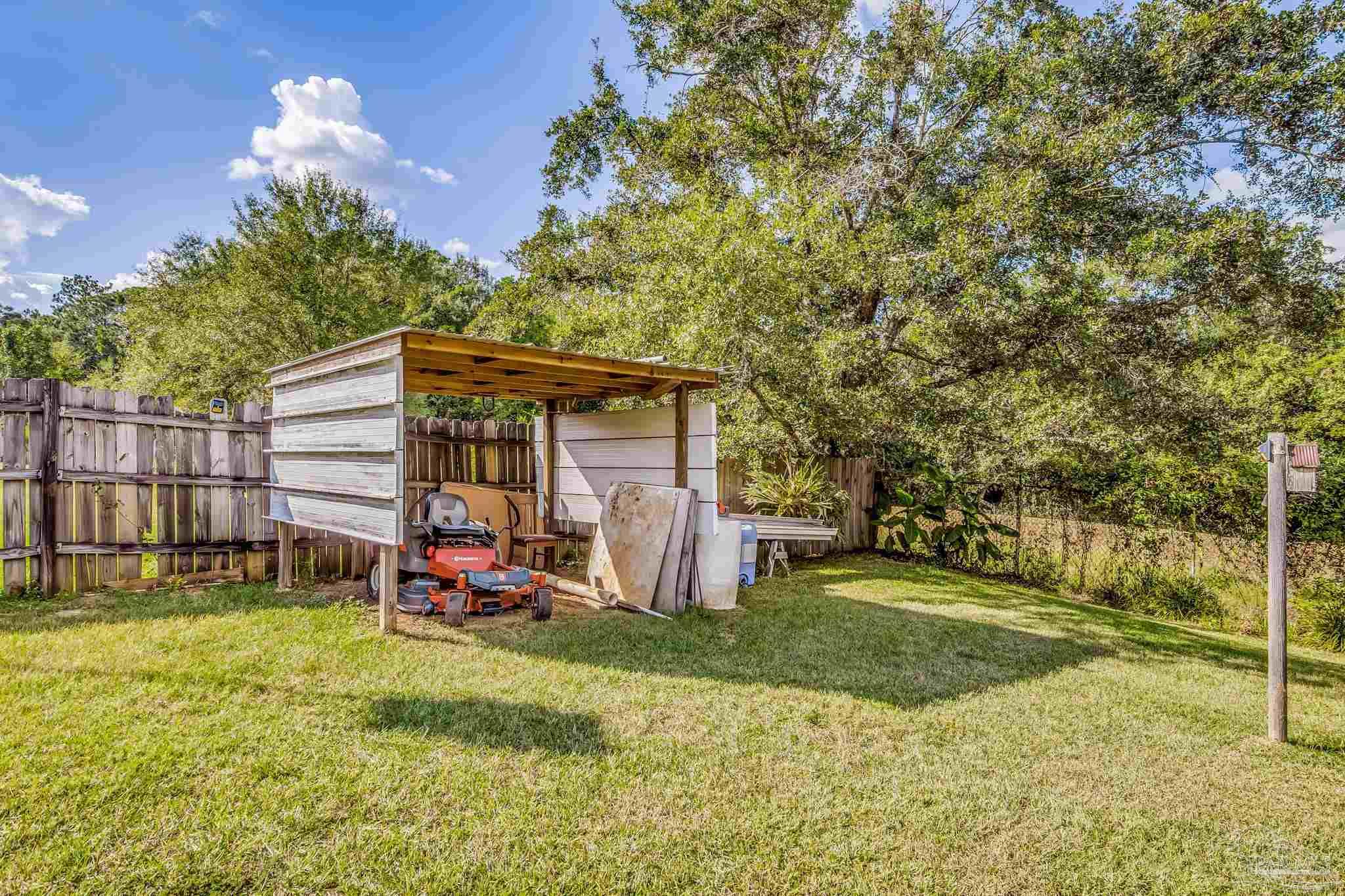 2000 Winners Circle Cantonment, FL 32533 - Photo 59 of 59 a view of a house with backyard