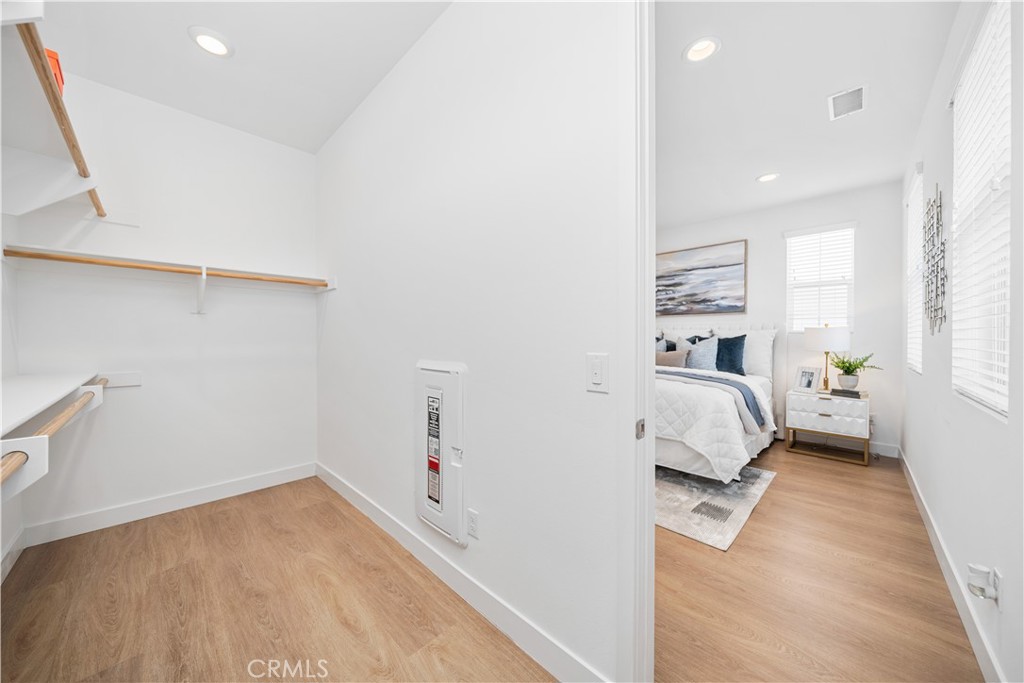11016 Getaway Drive Rancho Cucamonga, CA 91730 - Photo 29 of 44 a view of a bedroom with a bed and a window