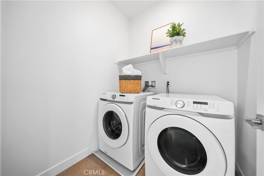 11016 Getaway Drive Rancho Cucamonga, CA 91730 - Photo 35 of 44 a utility room with dryer and washer