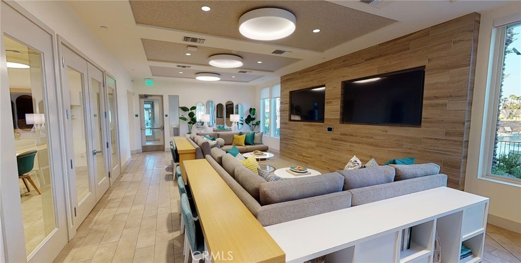 11016 Getaway Drive Rancho Cucamonga, CA 91730 - Photo 43 of 44 a living room with furniture and a flat screen tv