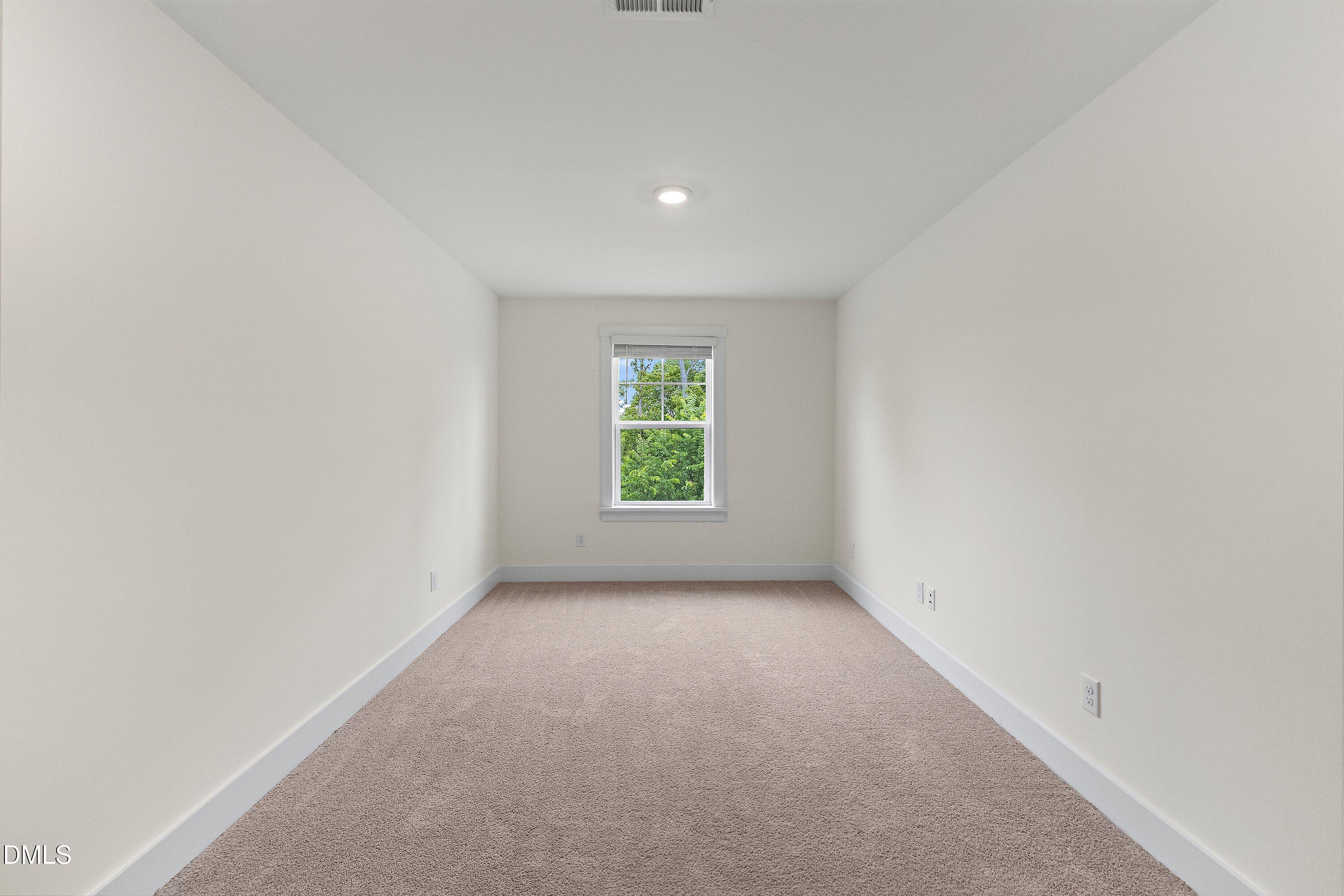 156 Sears Ridge Lane Morrisville, NC 27560 - Photo 26 of 49 an empty room with windows