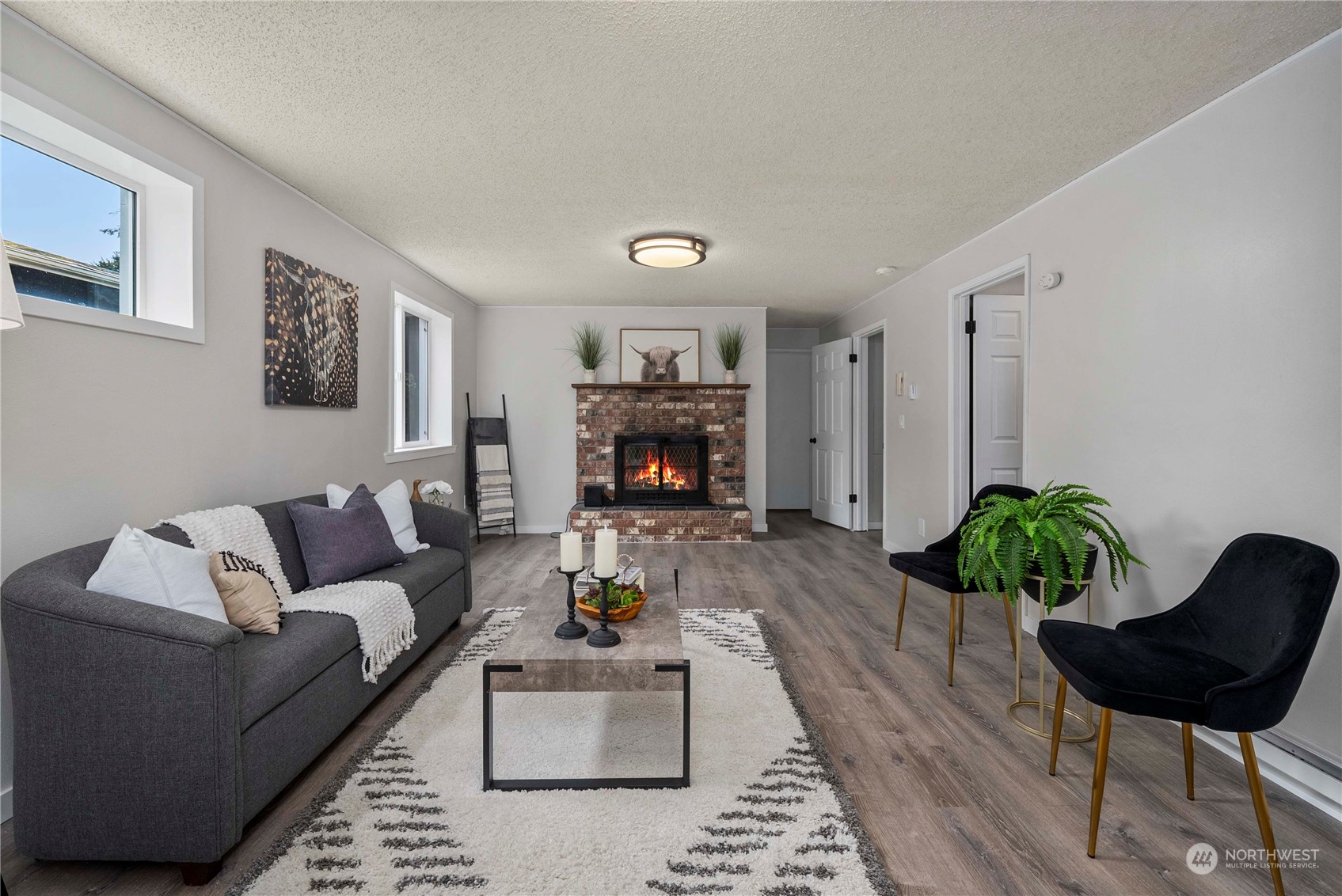 2004 North E Street Aberdeen, WA 98520 - Photo 20 of 38 a living room with furniture and a fireplace