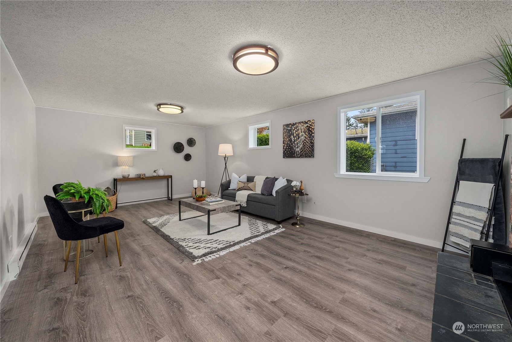 2004 North E Street Aberdeen, WA 98520 - Photo 22 of 38 a living room with furniture and a wooden floor