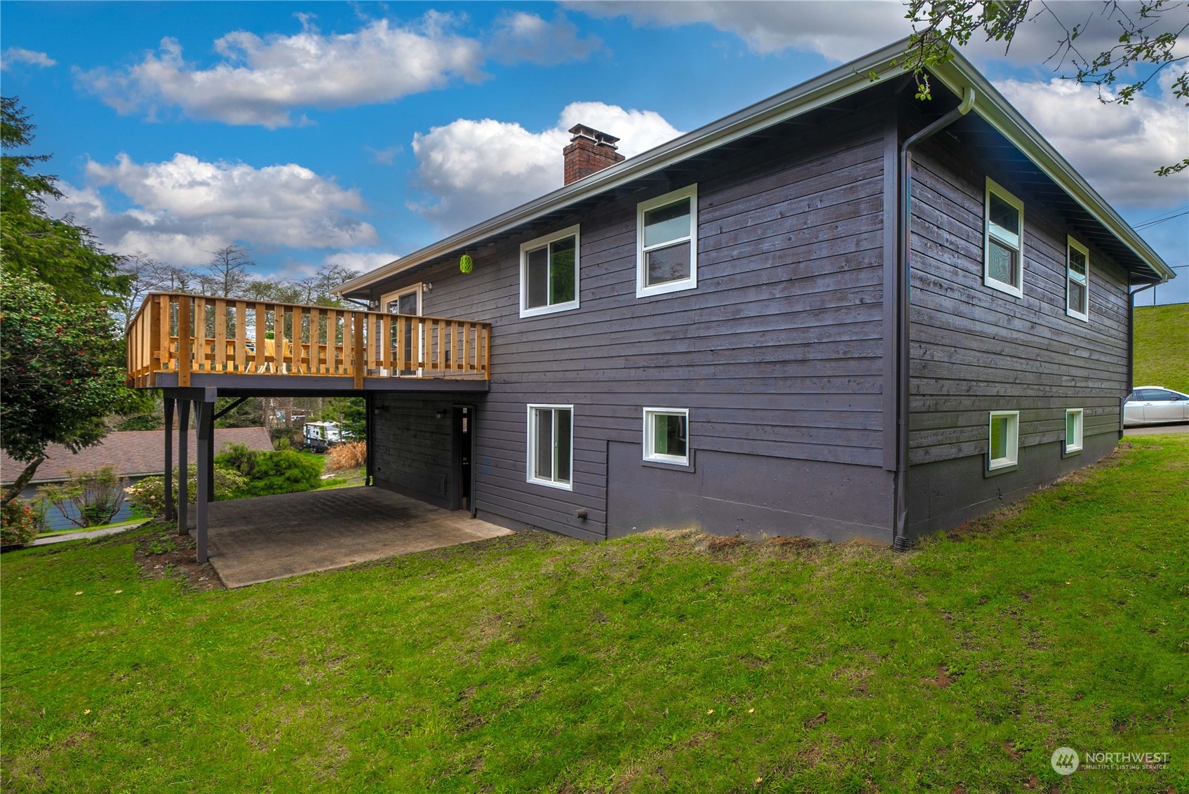 2004 North E Street Aberdeen, WA 98520 - Photo 31 of 38 a view of a house with brick walls and a yard