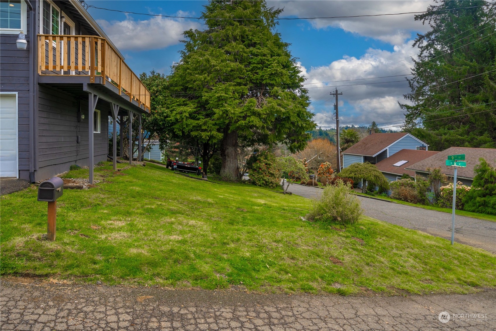 2004 North E Street Aberdeen, WA 98520 - Photo 32 of 38 a view of a house with a yard