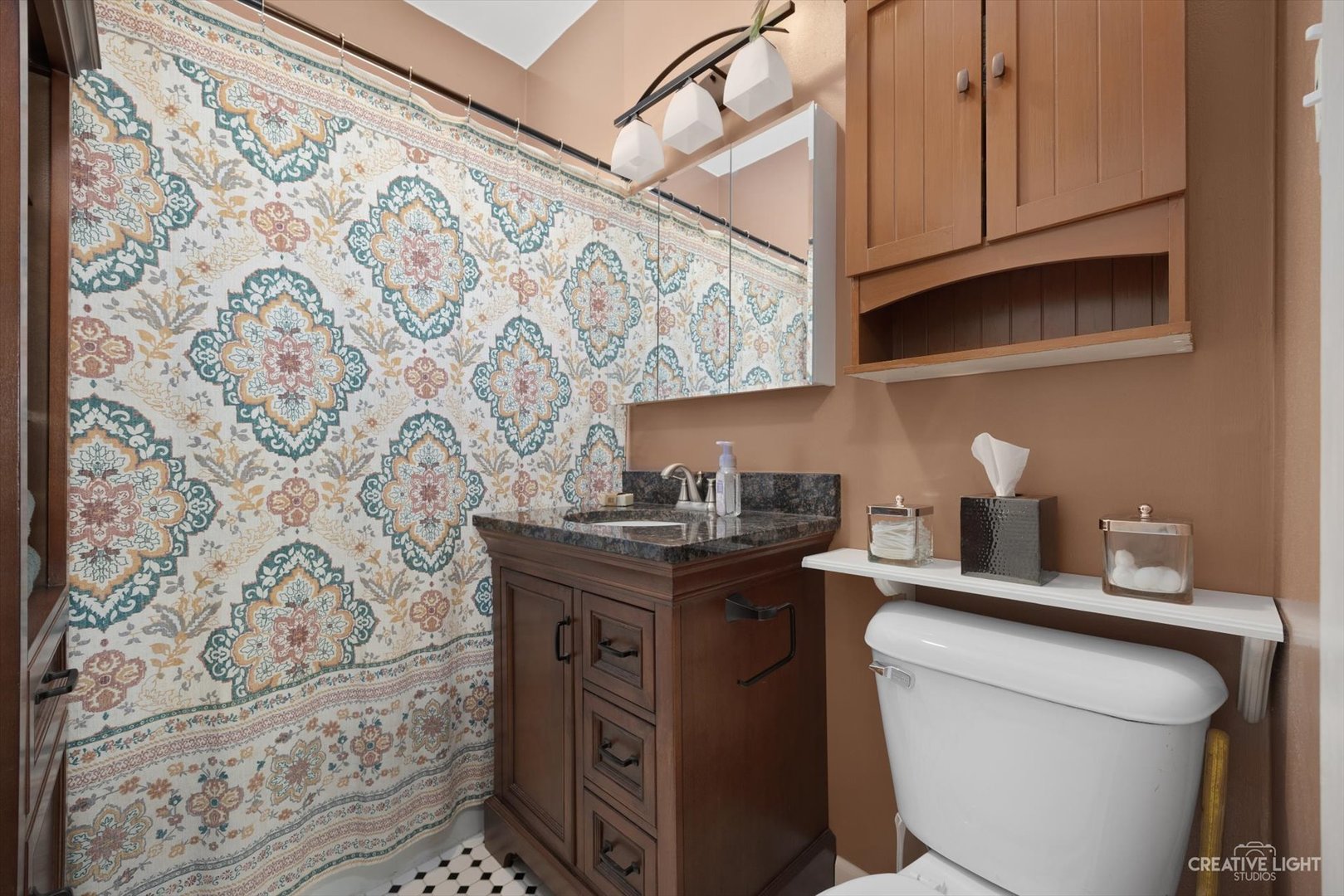 4534 Deyo Avenue Brookfield, IL 60513 - Photo 11 of 17 a kitchen with stainless steel appliances granite countertop a stove and a sink