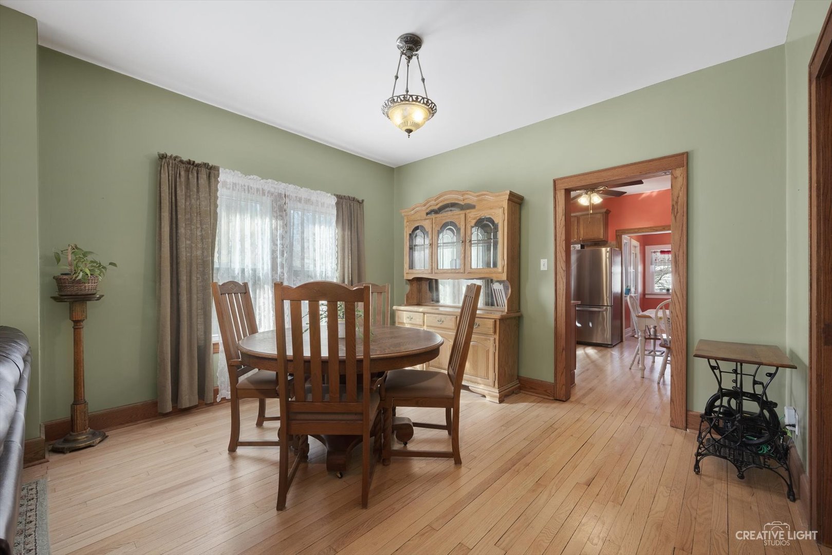 4534 Deyo Avenue Brookfield, IL 60513 - Photo 4 of 17 a view of a a dining room with furniture window and wooden floor