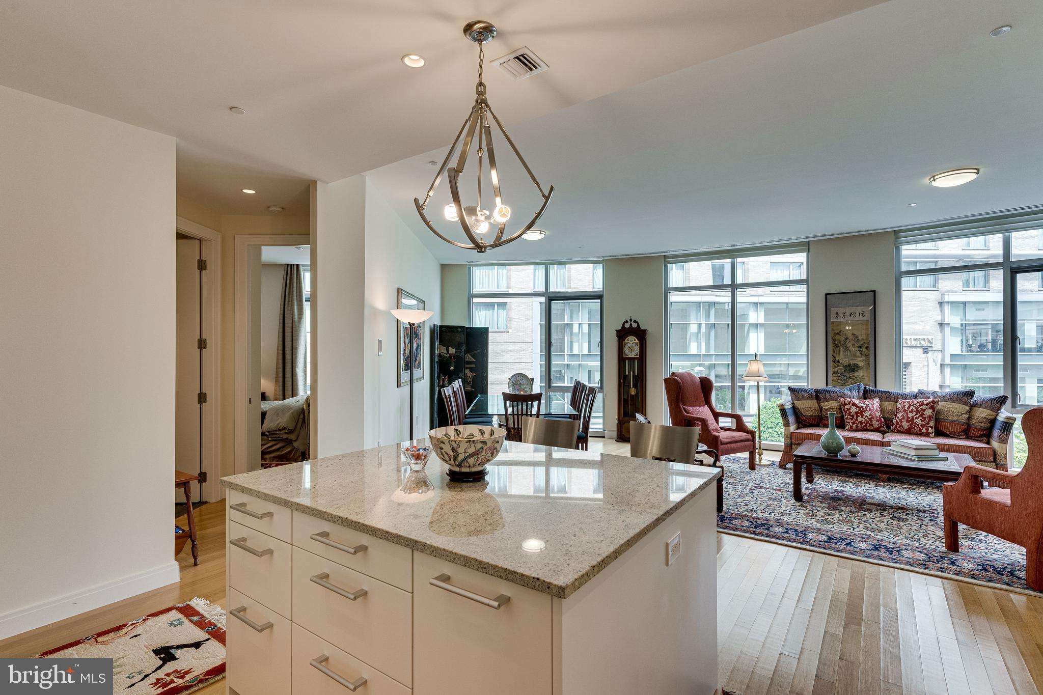 1177 22nd Street Northwest, Unit 3M Washington, DC 20037 - Photo 5 of 26 Kitchen view into living area