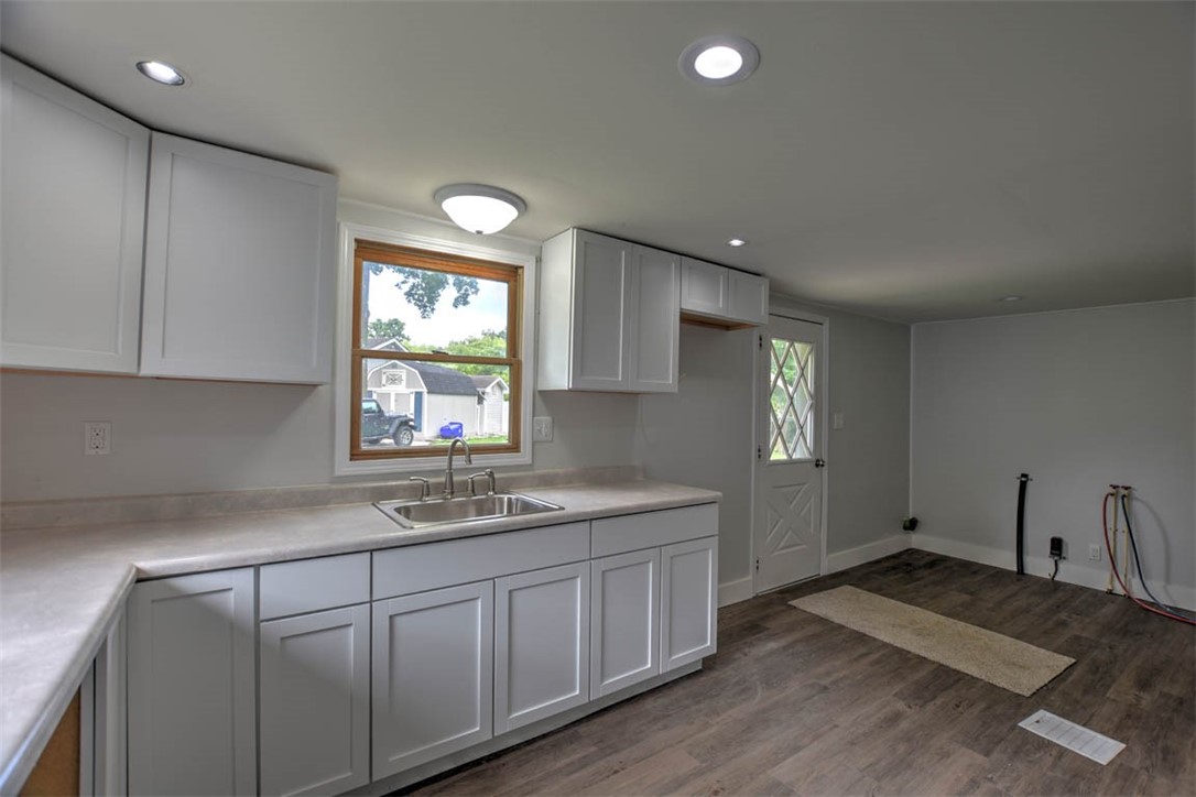 33 Lake Grove Club Decatur, IL 62521 - Photo 12 of 24 a kitchen with sink cabinets and window