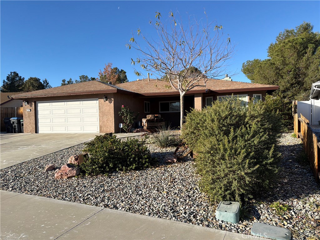 209 Kimberly Lane Ridgecrest, CA 93555 - Photo 2 of 62 a view of a house with a patio
