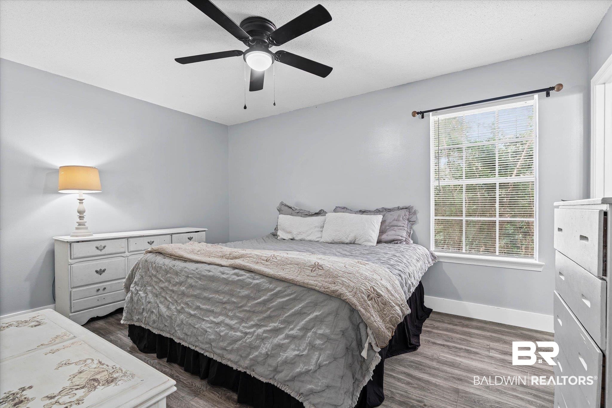 1849 Ranch House Drive Semmes, AL 36575 - Photo 11 of 23 Bedroom featuring dark wood-type flooring and a ceiling fan