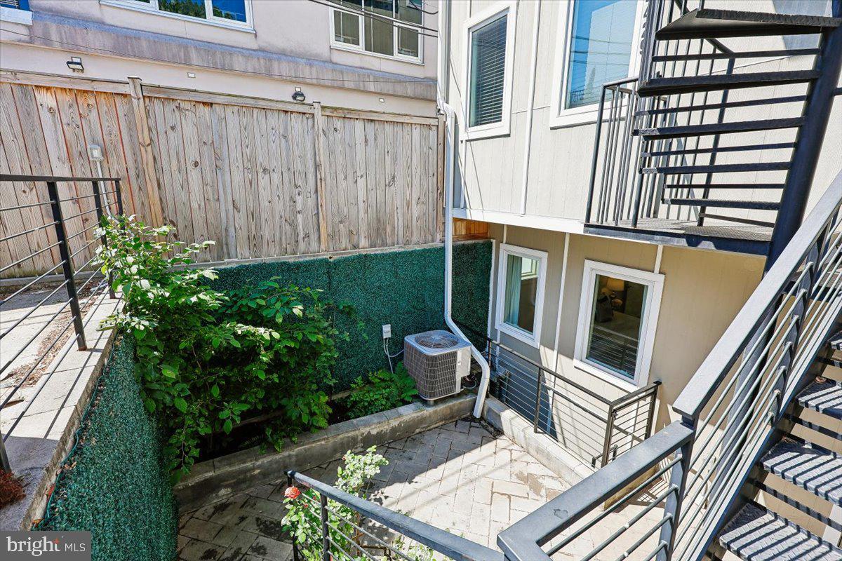 2429 Ontario Road Northwest, Unit 2 Washington, DC 20009 - Photo 49 of 52 Private patio with lovely blooming roses
