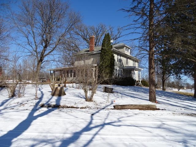 2182 North Flansburg Road Freeport, IL 61032 - Photo 1 of 23 a view of a house with a patio