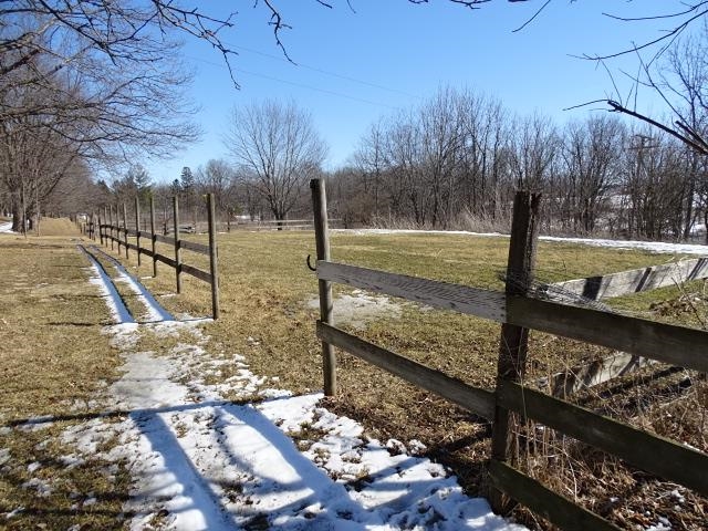 2182 North Flansburg Road Freeport, IL 61032 - Photo 14 of 23 a view of a yard with wooden fence