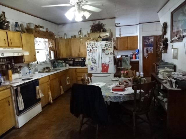2182 North Flansburg Road Freeport, IL 61032 - Photo 21 of 23 a kitchen with a sink stove and refrigerator