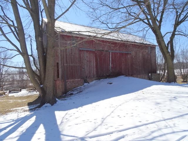 2182 North Flansburg Road Freeport, IL 61032 - Photo 7 of 23 a view of a backyard of a house