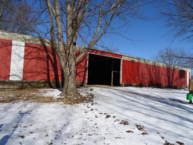 2182 North Flansburg Road Freeport, IL 61032 - Photo 8 of 23 a view of a backyard of the house