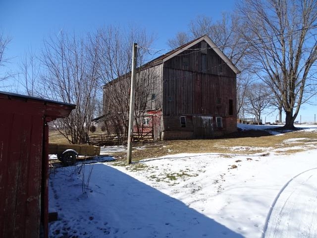 2182 North Flansburg Road Freeport, IL 61032 - Photo 10 of 23 a view of a house with snow on the road