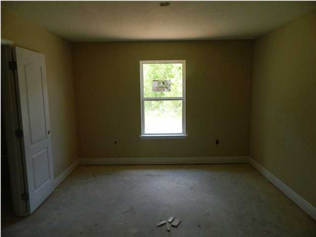 4505 Hermosa Road Crestview, FL 32539 - Photo 13 of 18 an empty room with a window