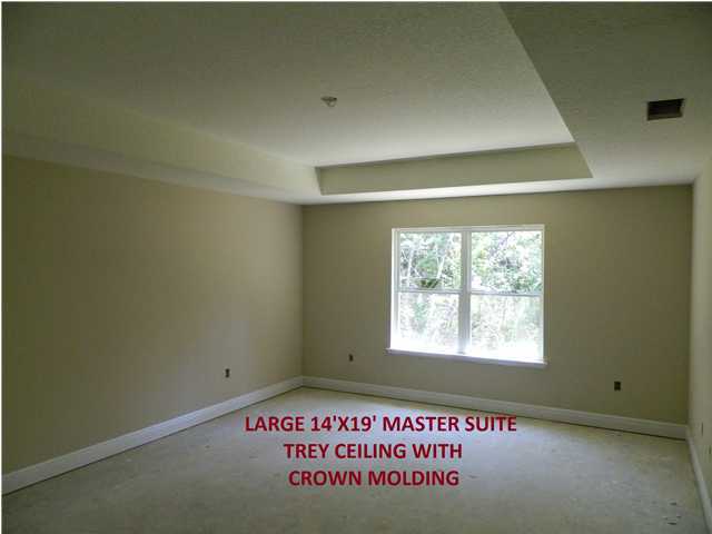 4505 Hermosa Road Crestview, FL 32539 - Photo 14 of 18 a view of an empty room with a window