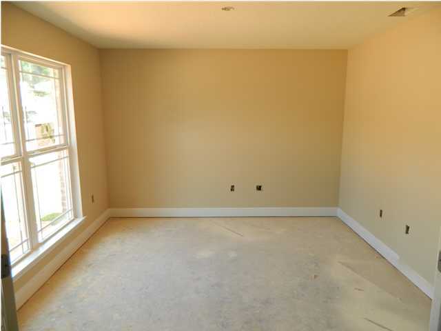 4505 Hermosa Road Crestview, FL 32539 - Photo 3 of 18 a view of an empty room with a window