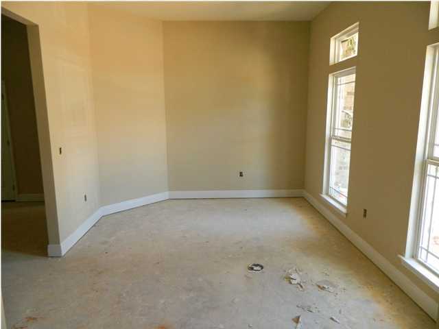 4505 Hermosa Road Crestview, FL 32539 - Photo 4 of 18 an empty room with windows