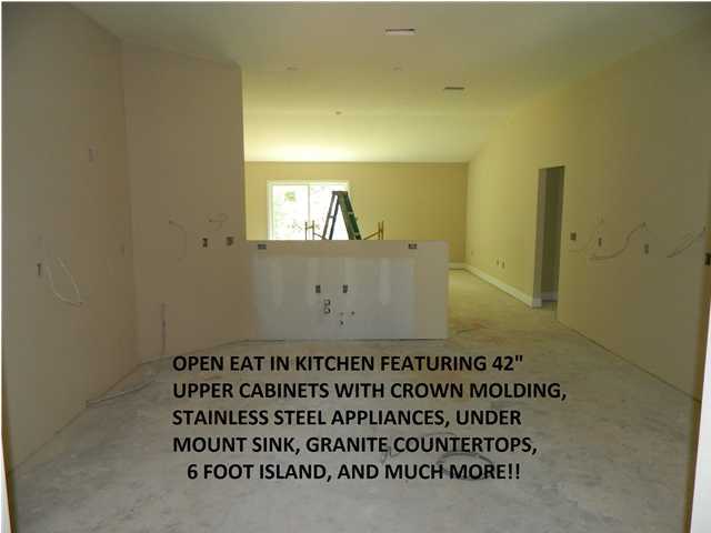 4505 Hermosa Road Crestview, FL 32539 - Photo 5 of 18 a bathroom with a window