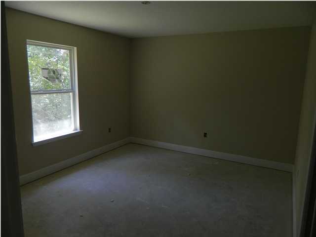 4505 Hermosa Road Crestview, FL 32539 - Photo 9 of 18 an empty room with a window