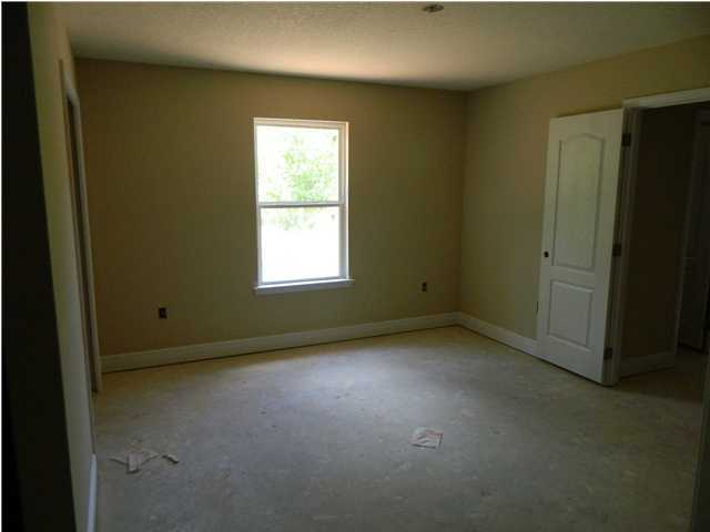 4505 Hermosa Road Crestview, FL 32539 - Photo 10 of 18 an empty room with a window