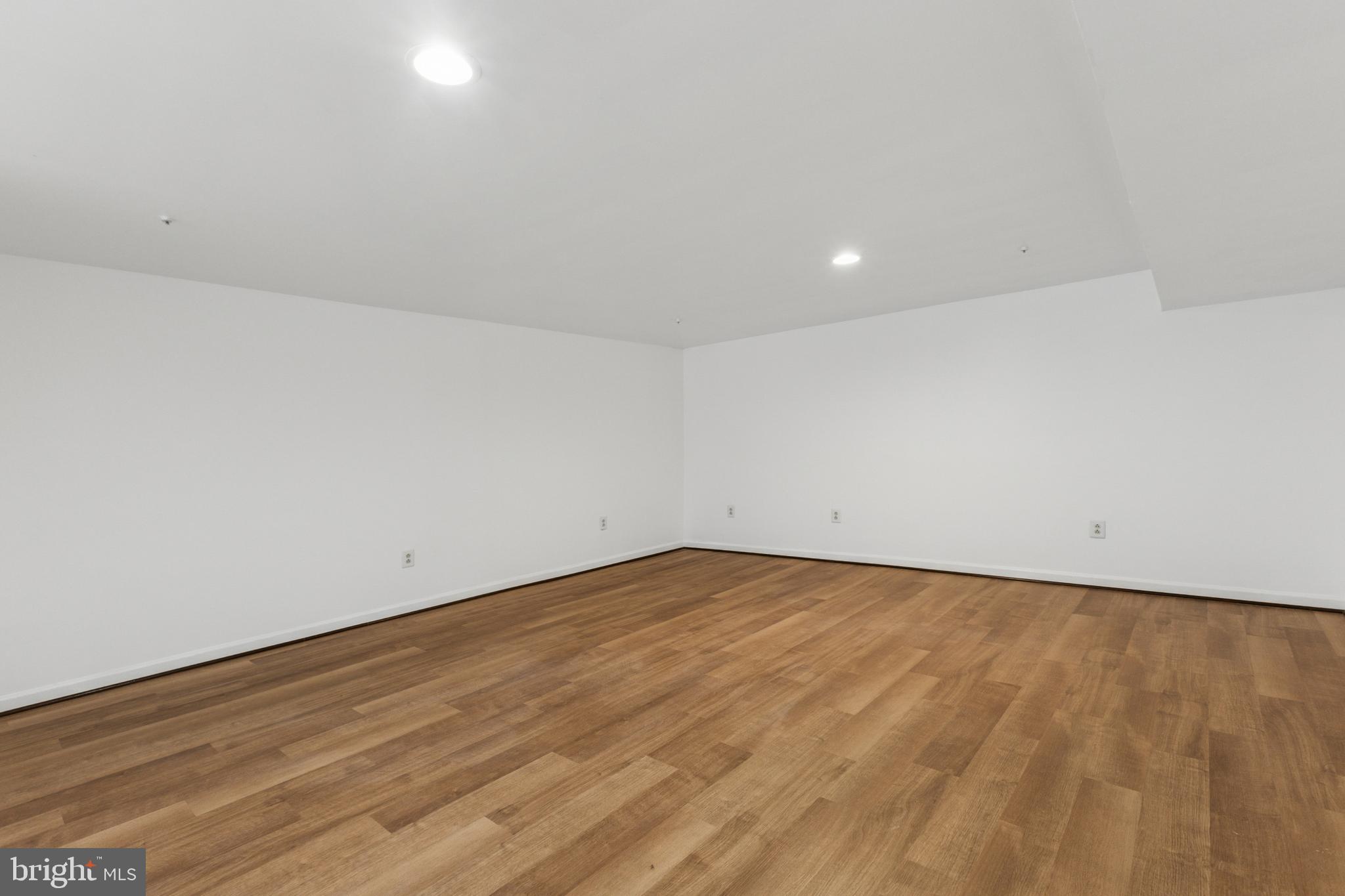 3401 Kidder Road Clinton, MD 20735 - Photo 21 of 45 a view of an empty room with wooden floor