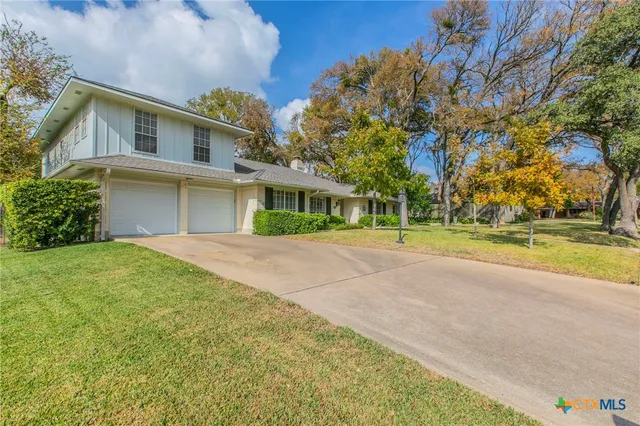 a view of a city with an ocean