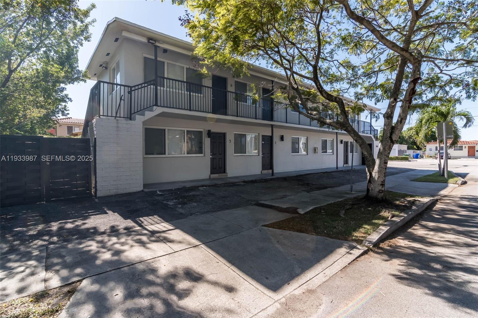 2190 Southwest 14th Terrace, Unit 1 Miami, FL 33145 - Photo 12 of 13 a view of a house with a yard