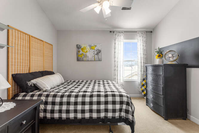 3761 Thornhill Circle Champaign, IL 61822 - Photo 12 of 18 a bedroom with a bed and painting on the wall