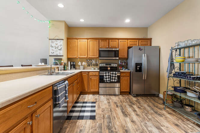 3761 Thornhill Circle Champaign, IL 61822 - Photo 6 of 18 a kitchen with stainless steel appliances a refrigerator and a sink