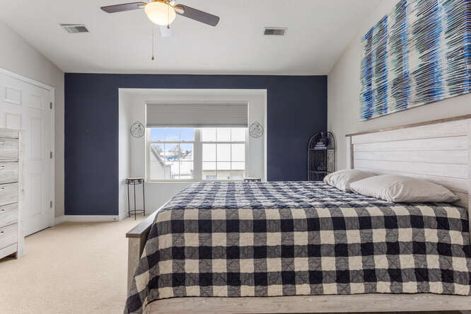 3761 Thornhill Circle Champaign, IL 61822 - Photo 8 of 18 a bedroom with a bed and a chandelier