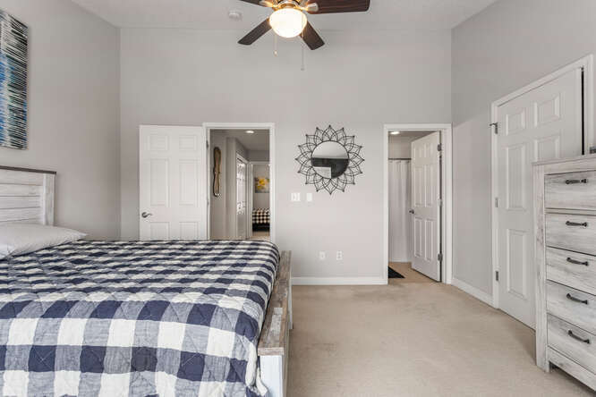 3761 Thornhill Circle Champaign, IL 61822 - Photo 9 of 18 a bedroom with a bed and a chandelier