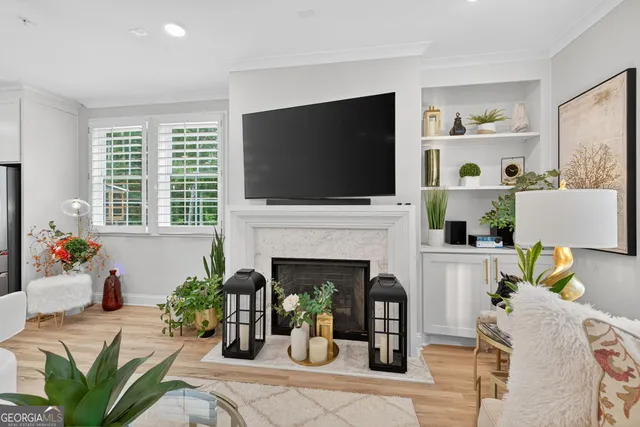 a white bath tub sitting next to a white sink