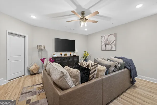 an aerial view of a house with a swimming pool
