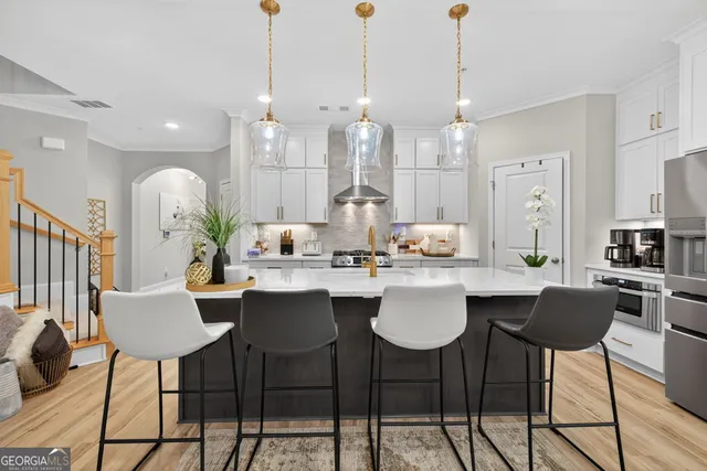 a living room with fireplace furniture and a flat screen tv