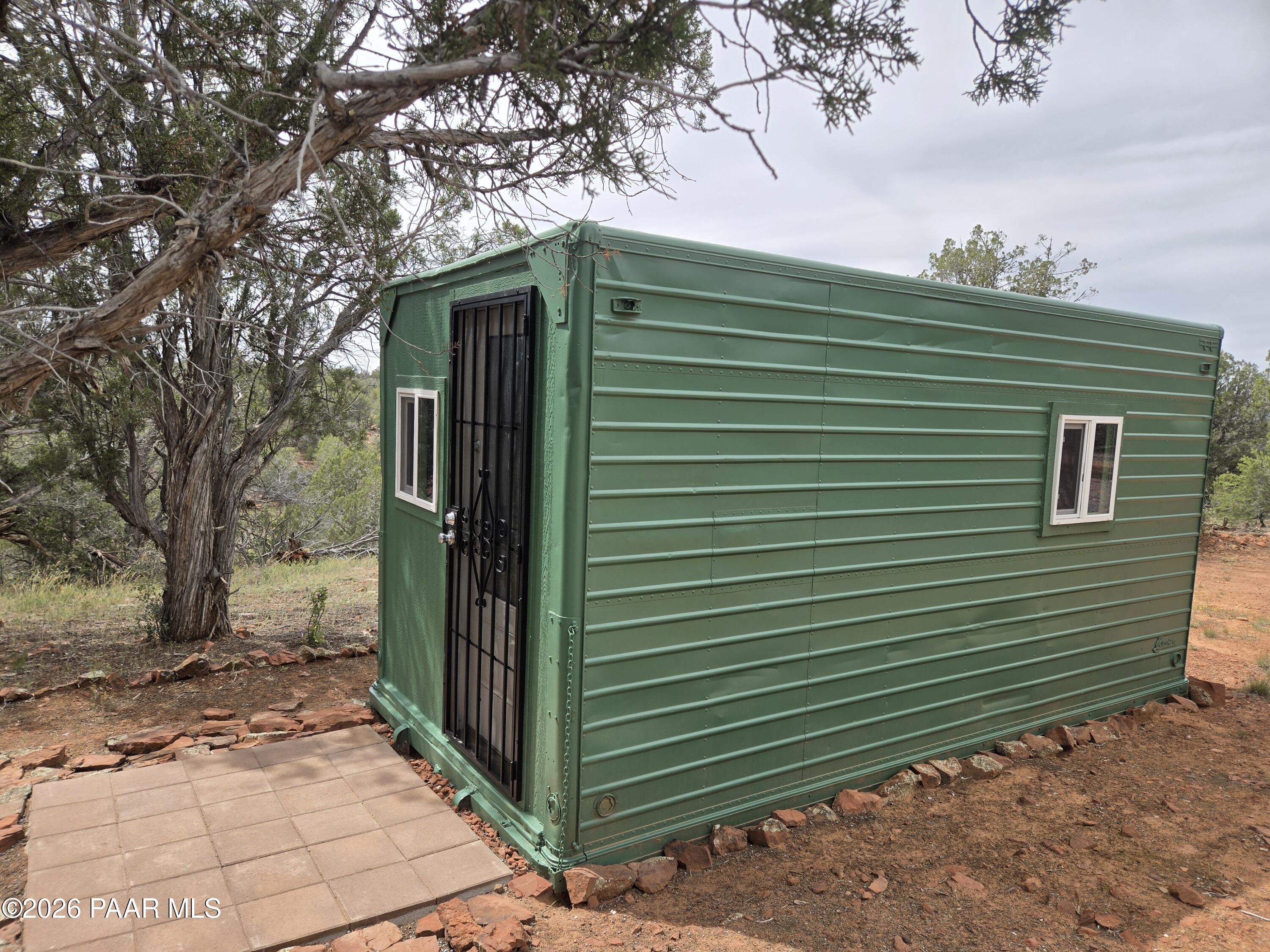 61 Raney Road Ash Fork, AZ 86320 - Photo 2 of 19 a view of a backyard