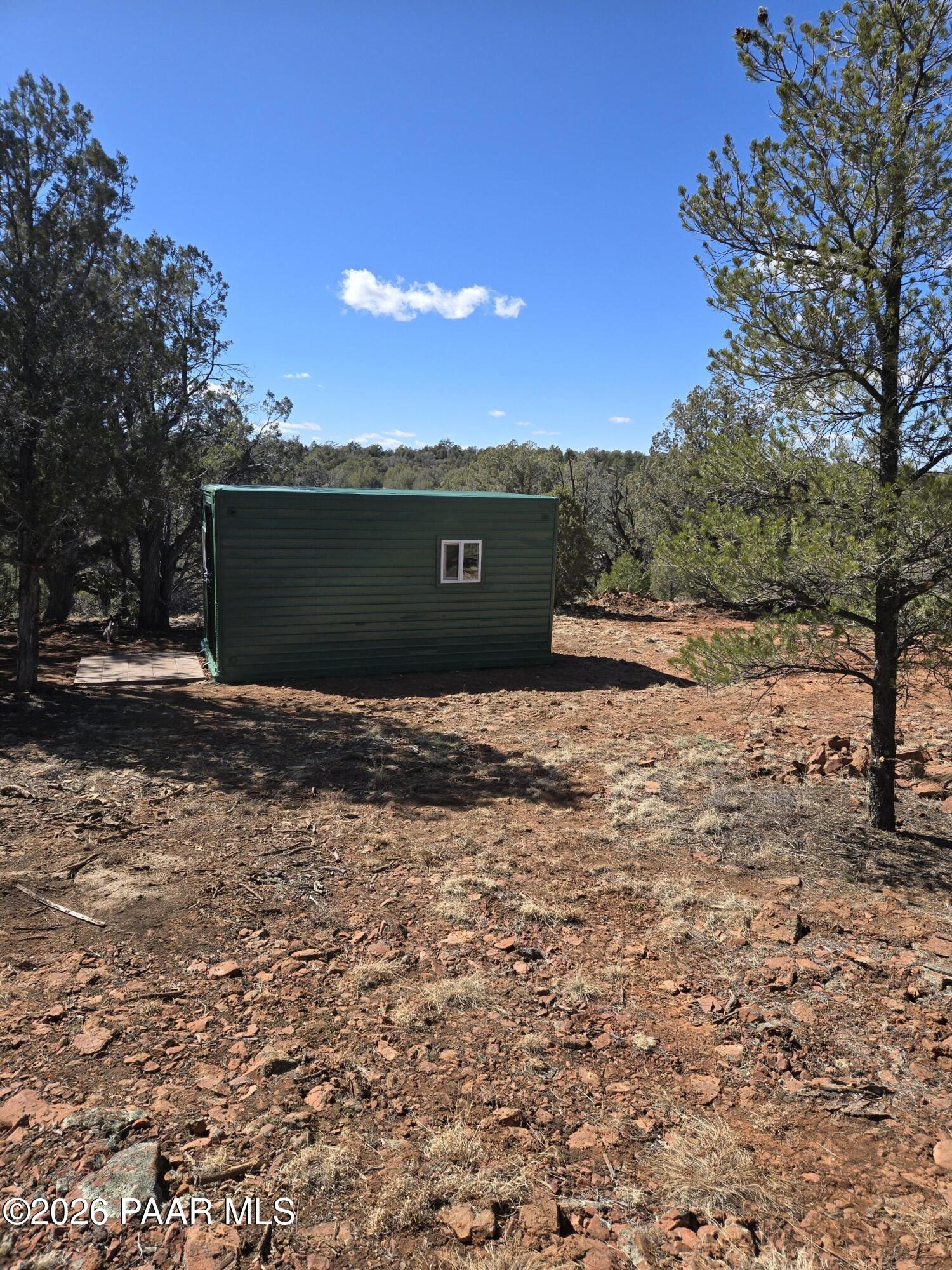 61 Raney Road Ash Fork, AZ 86320 - Photo 4 of 19 a view of a yard with a house